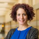 A  woman with curly hair